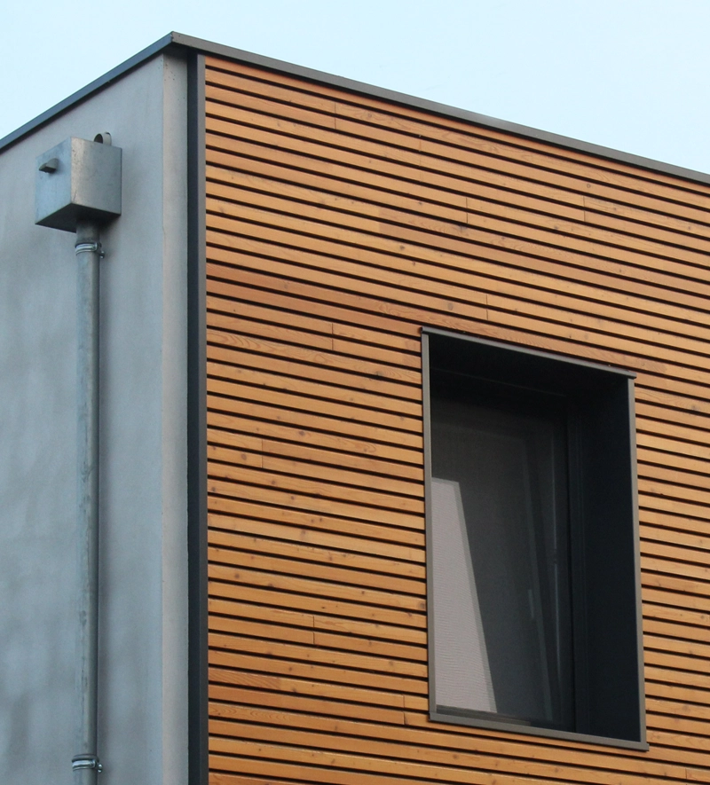 Bardage bois et évacuation bâtiment zinguerie goutière